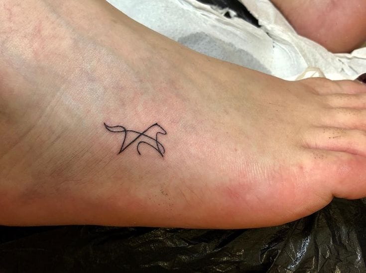 minimalist horse tattoo