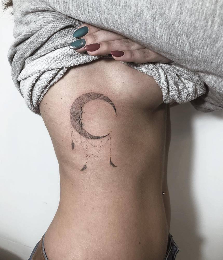 ribcage moon tattoo
