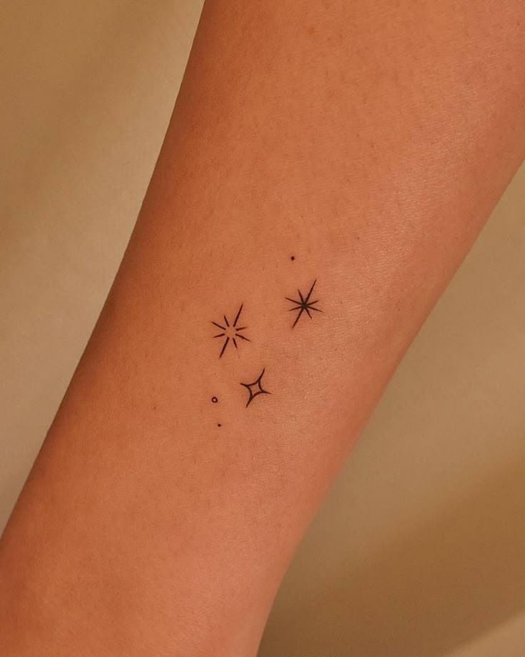 minimalist star tattoo