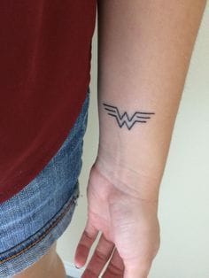 small dwma logo tattoo