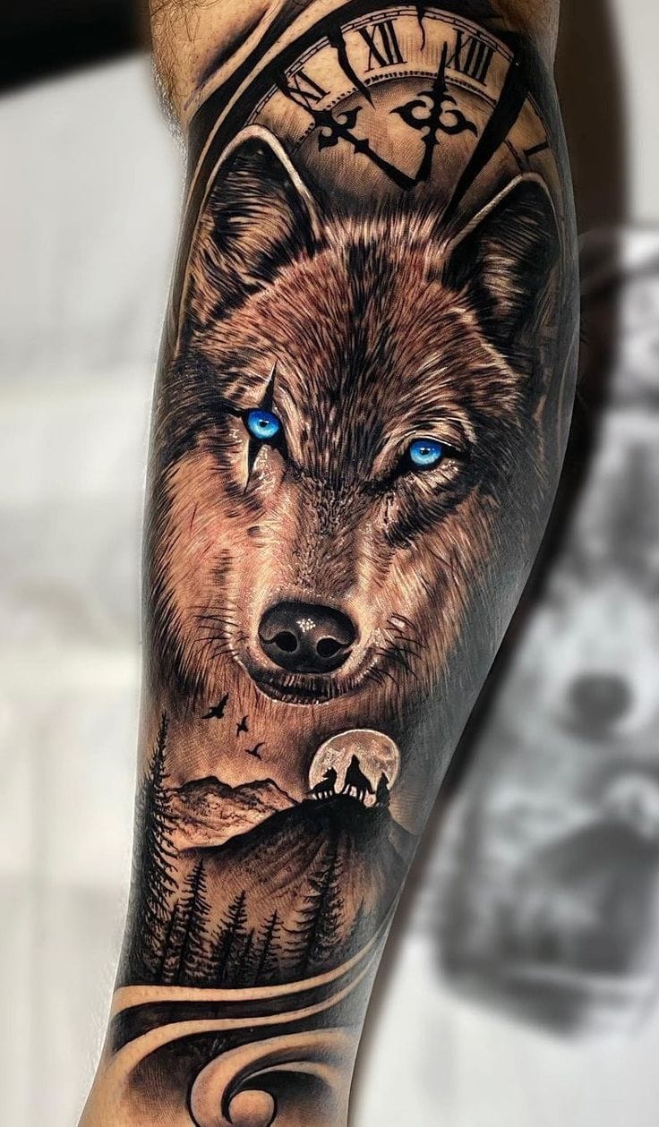 a masculine upper arm tattoo with wolf design