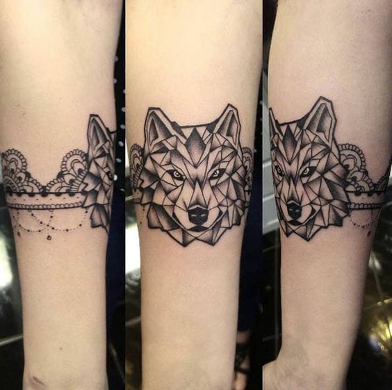 geometric animal armband tattoo