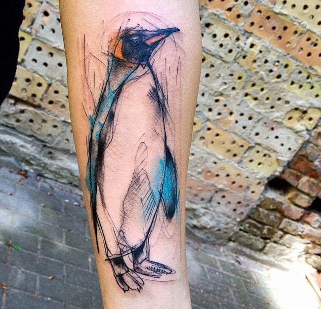 watercolor style penguin tattoo