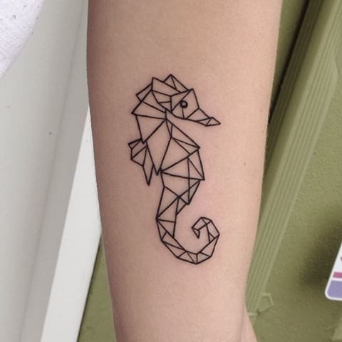geometric seahorse tattoo