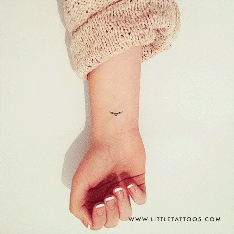 golden snitch tattoo