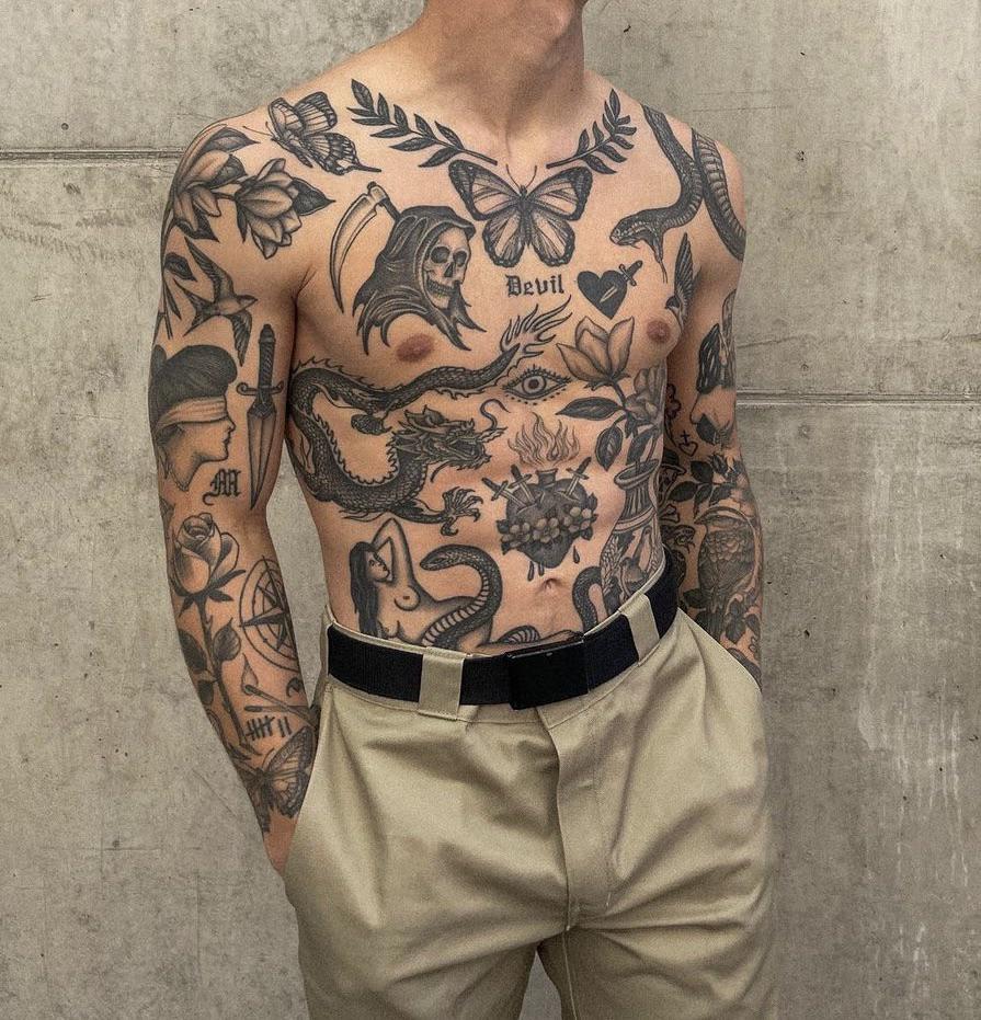 neo-traditional patchwork sleeve tattoo
