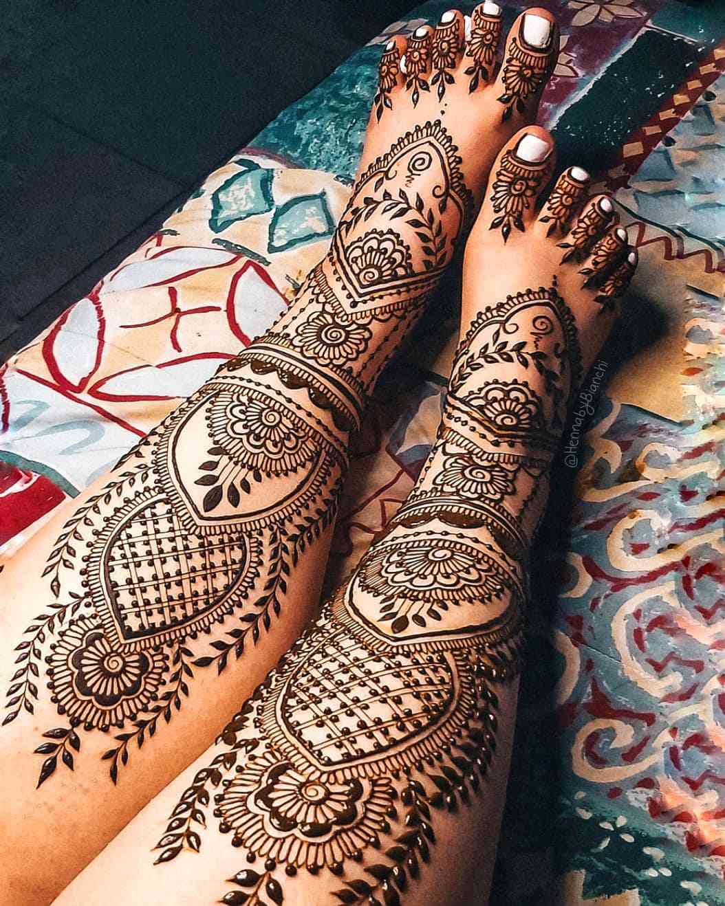 an Indian tattoo with henna-inspired designs
