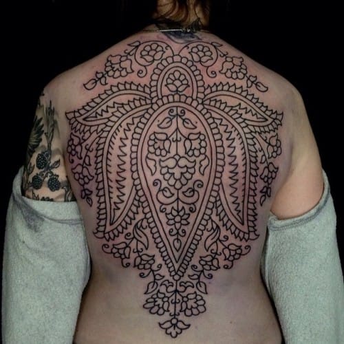 an Indian tattoo with Indian paisley design