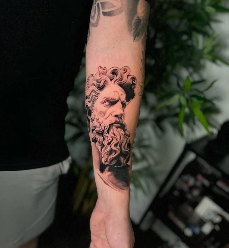abstract zeus forearm tattoo