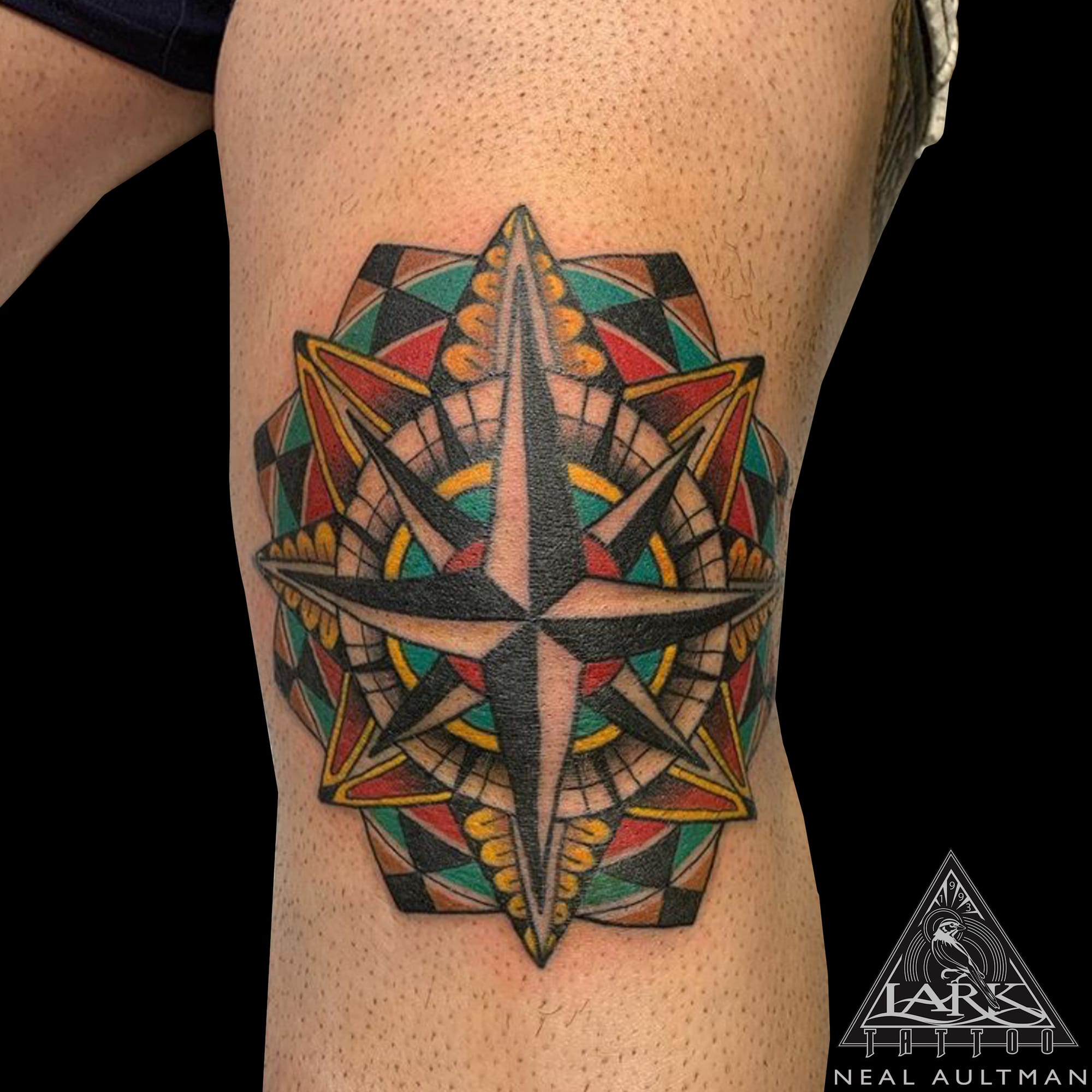 compass knee tattoo