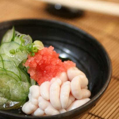 a gourmet sushi dish with fish sperm