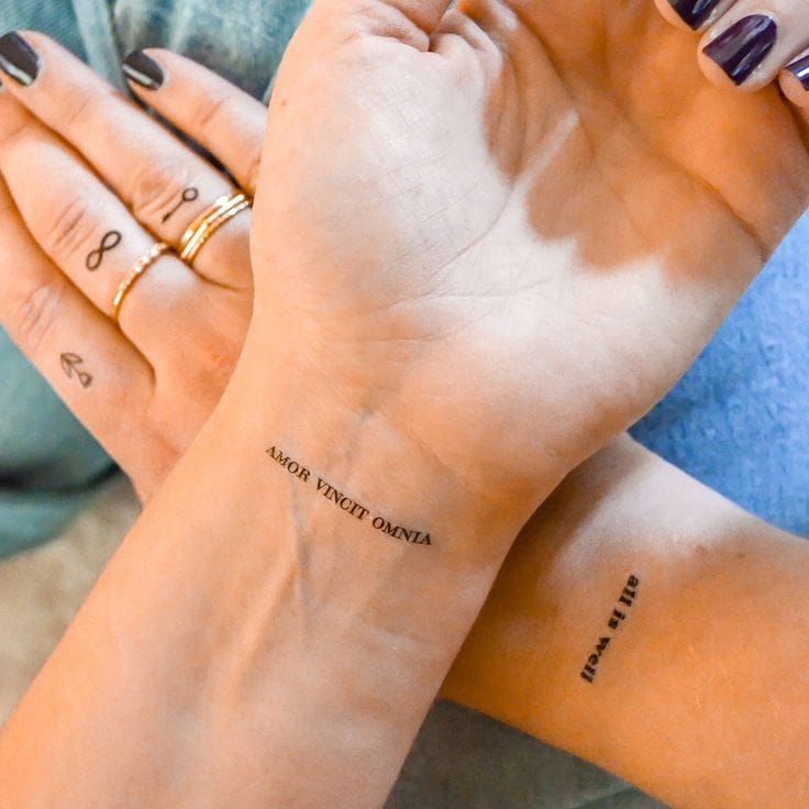 Delicate script transforms these wrists into a canvas for eternal devotion, with