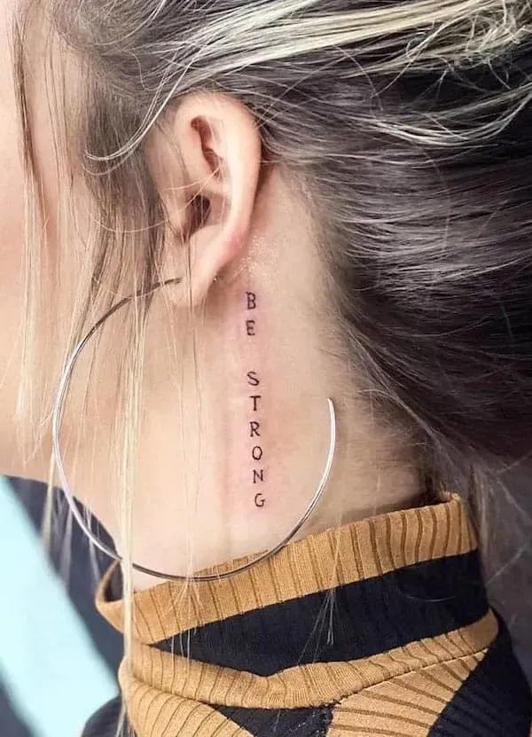 Vertical lettering cascades down the neck in this striking
