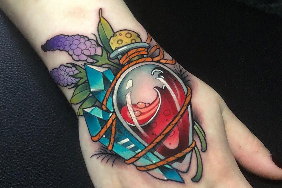 Vibrant new school artistry transforms this hand into a living canvas, featuring a mesmerizing potion bottle overflowing with magical essence and crowned with mystical foliage 🧪 The bold color palette and dynamic shading create incredible depth, while the strategic placement across the hand's natural curves makes every gesture feel enchanted. Perfect fusion of fantasy elements and technical mastery that brings fairy tale vibes to life!