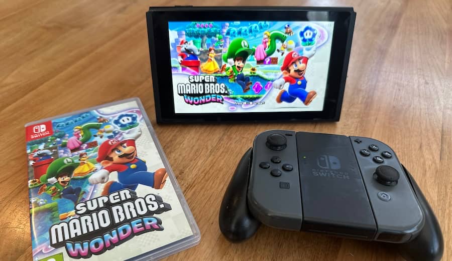 Playing Super Mario Bros. Wonder on a Nintendo Switch in Kickstand Mode