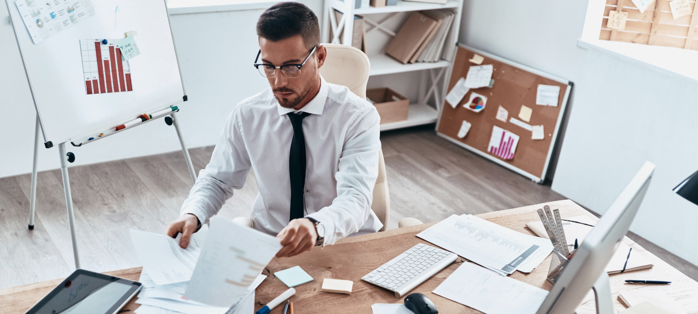 person in the office - How to Dissolve an LLC in Michigan