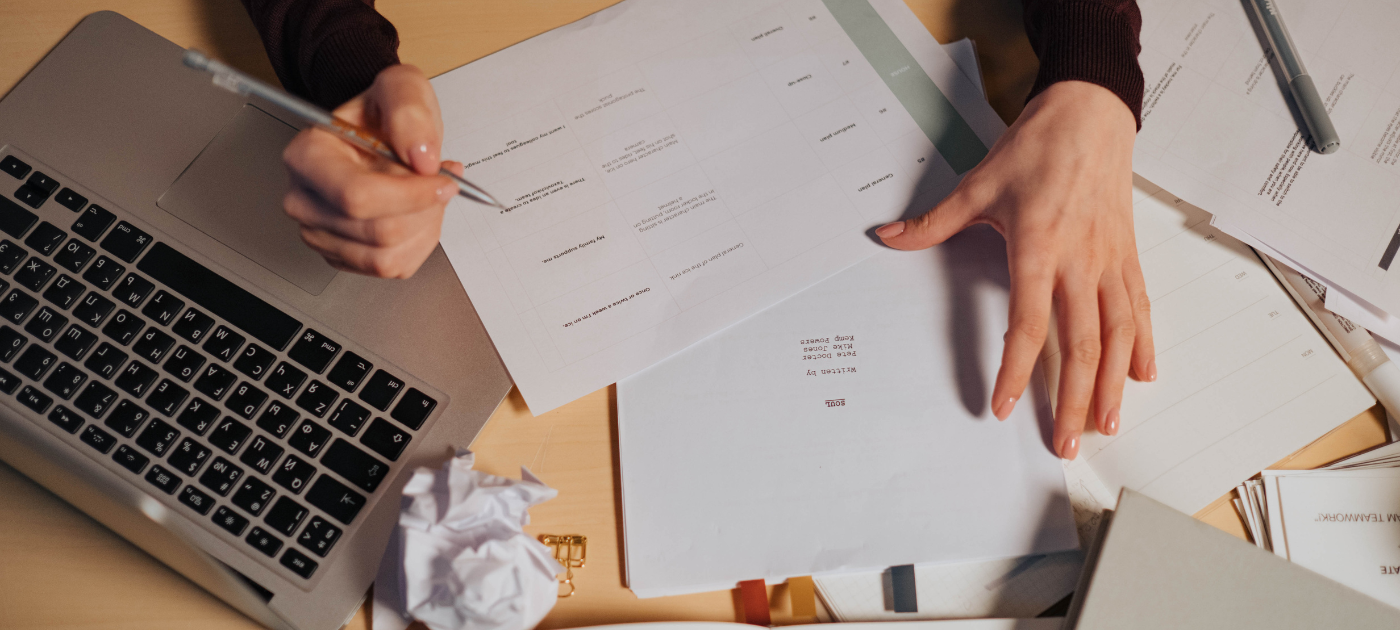 person with documents - How to Dissolve an LLC in Georgia