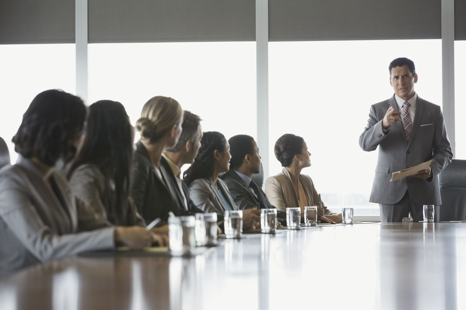 man in a board meeting - How to Dissolve an LLC in Missouri