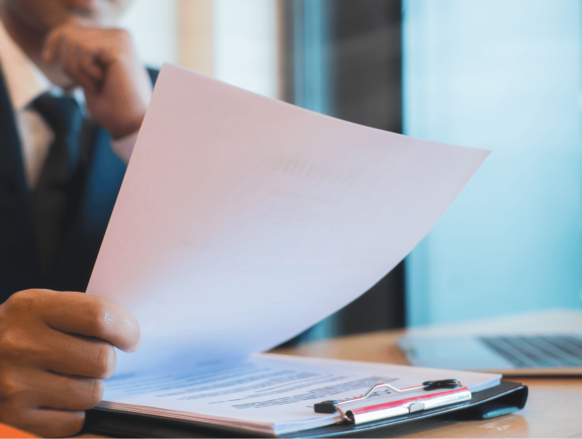 person reading a document - How to Dissolve an LLC in Arizona