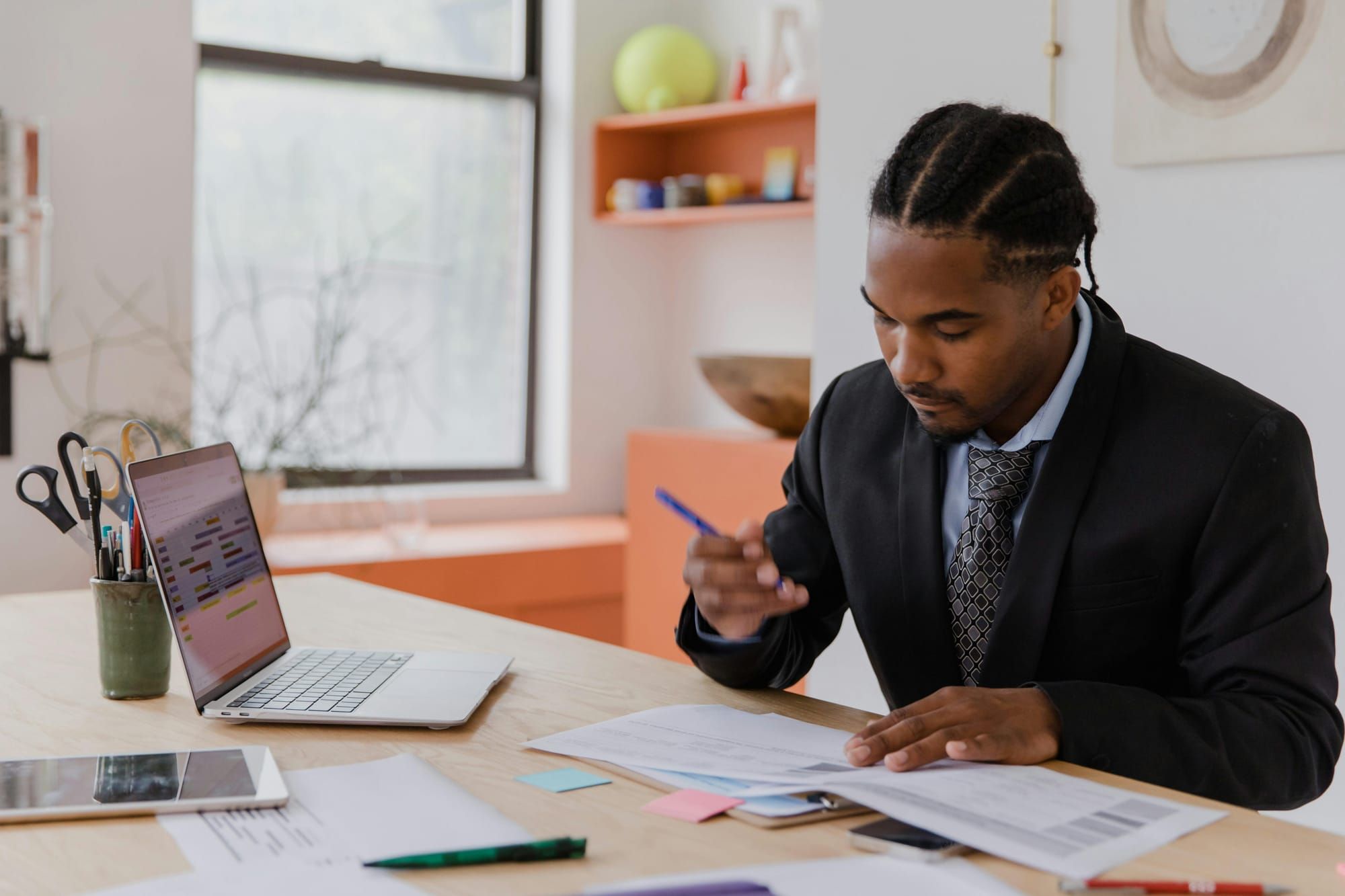 founder making notes - How to Dissolve an LLC in Wisconsin 