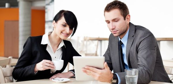 man reviewing document - How to Dissolve a Corporation in New York