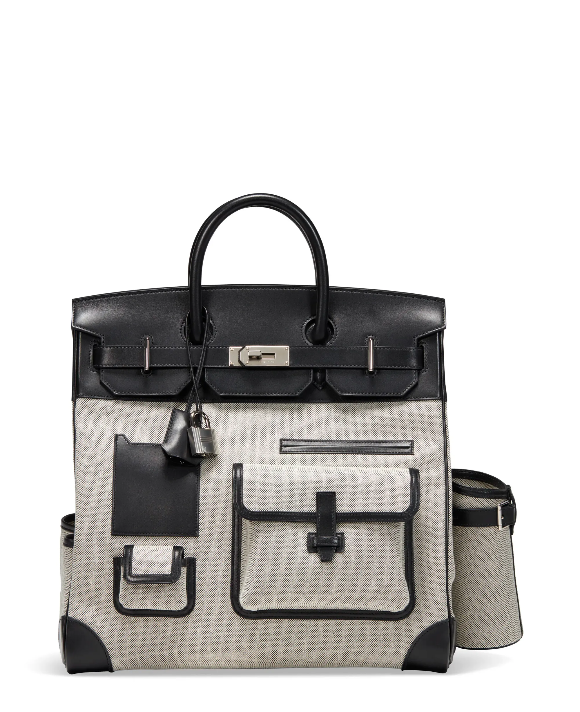 Hermès HAC Cargo 40 最出名細節之一,就係外掛式杯架設計,令整個袋款充滿旅行裝備感。