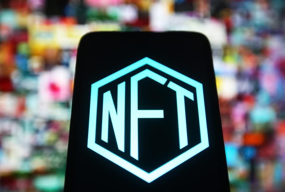 In this photo illustration, a NFT (Non-fungible token.