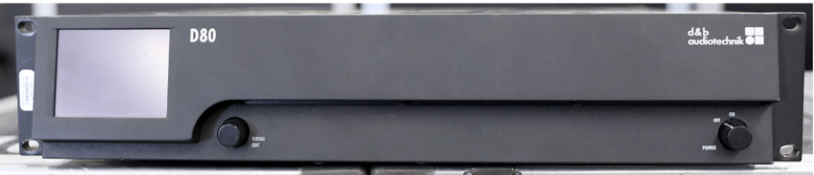 A screen grab of a muti-channel power amp  front panel, with a silver logo on a black background that says d&b autiotechnik