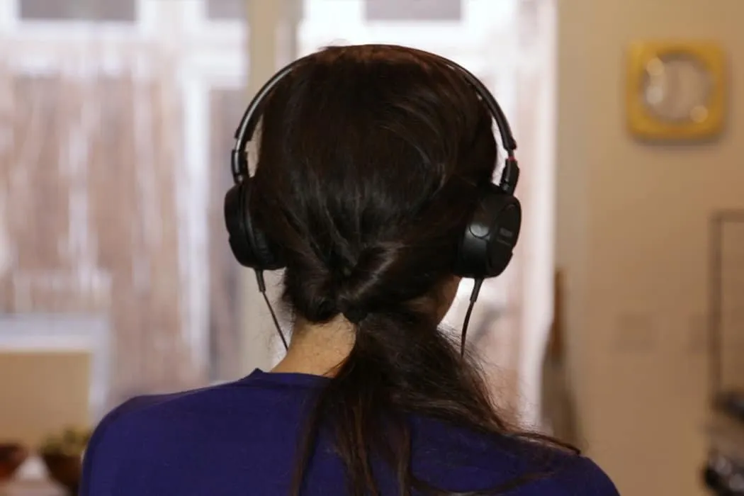 Headphones on woman listening to music or podcast, music technology, audio equipment, lifestyle, casual indoor setting, Hypeb