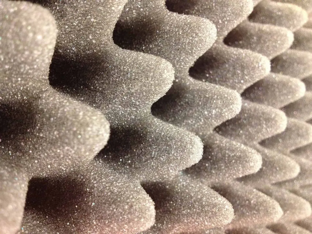 Microfiber foam rollers for acoustic treatment or soundproofing, close-up image highlighting the textured surface and diamond