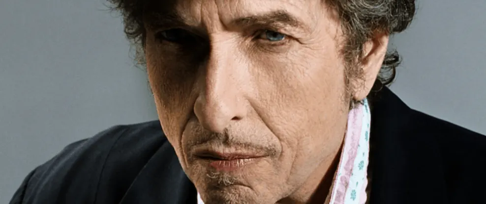 Photo of a man with intense expression, close-up portrait, professional headshot for music industry or entertainment context,