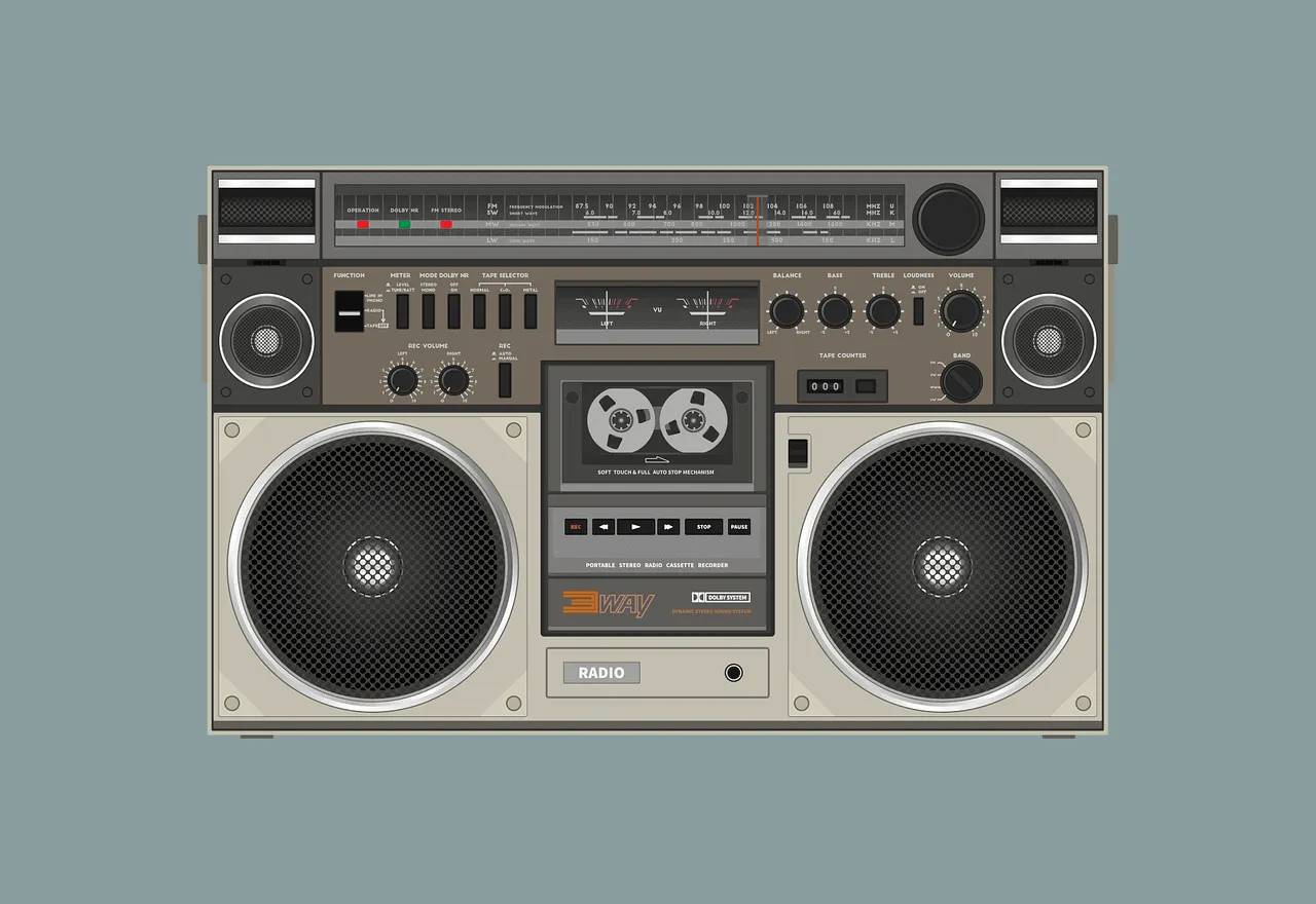Vintage boombox stereo with cassette deck, radio tuner, and speakers, representing music technology and retro audio equipment