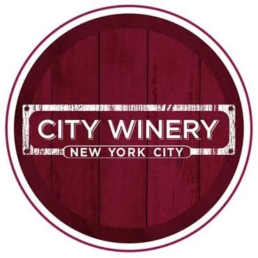 Vineyard logo with "City Winery New York City" on a dark red wooden background, representing a popular NYC wine bar and event