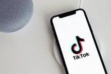 TikTok logo displayed on a smartphone screen, highlighting social media trends and digital marketing on the popular video-sha