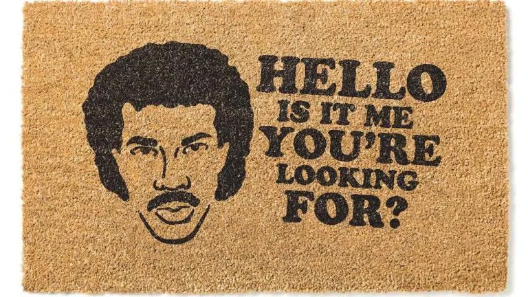 A chalkboard art featuring a stylized portrait of a man with curly hair and a mustache, accompanied by the bold text "Hello i