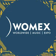 WOMEX 2023 logo showcasing world music expo, international music industry event, global artist showcase, and cultural music f