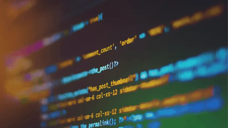 Code syntax highlighting on a computer screen, representing digital programming or web development.
