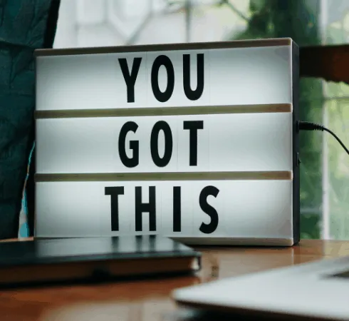 You got this motivational lightbox sign in a cozy workspace, inspiring creativity and confidence for music and media industry