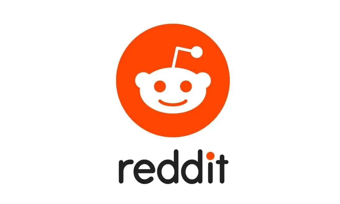 Reddit logo with orange circle and white alien face, representing popular social media platform for discussion and user-gener