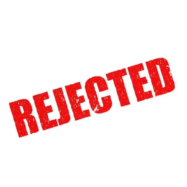 Rejection stamp on white background, indicating a rejected application or request. Suitable for articles about job rejections