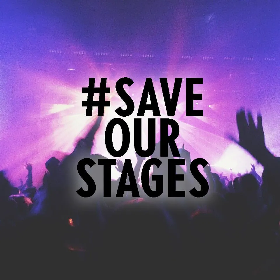 #SAVE OUR STAGES protest with a concert crowd in front of vibrant purple stage lighting.
