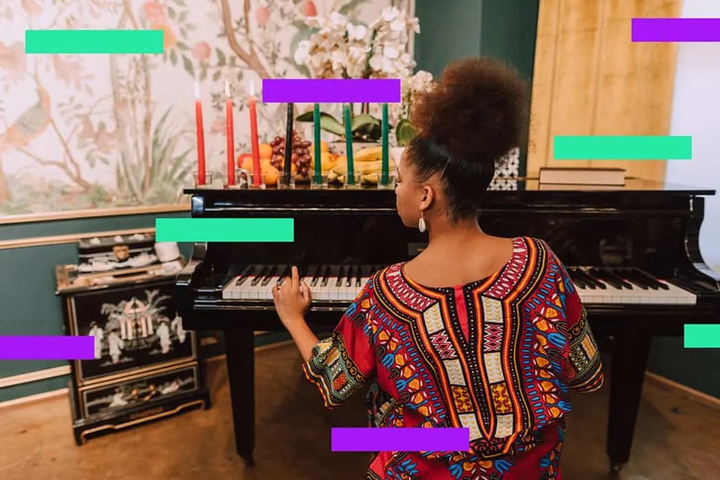 Creative African-American woman playing black grand piano in cozy room with flowers and fruits, celebrating cultural heritage