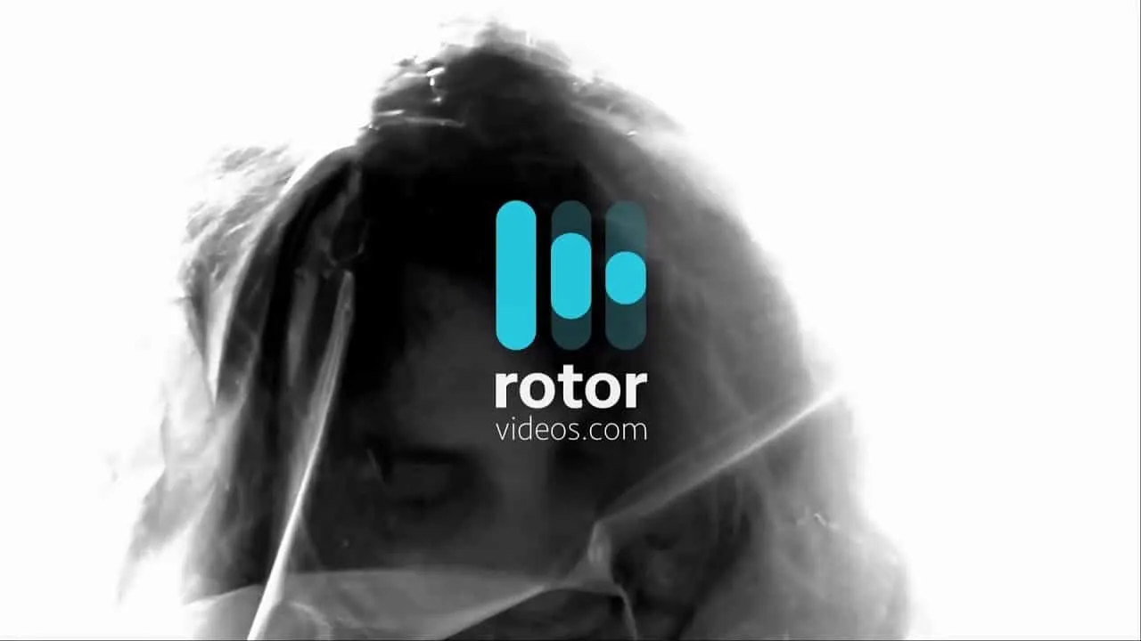 Rotor videos logo overlay on abstract black and white female face image, digital music and video streaming platform branding,