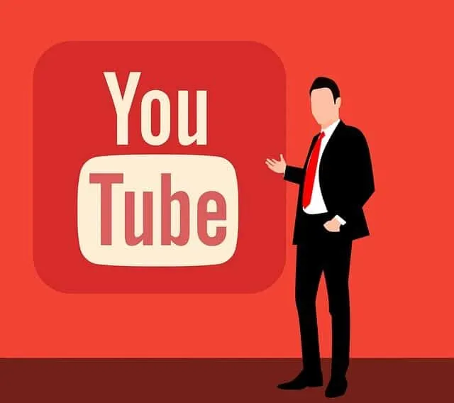 YouTube logo with a business professional pointing towards it, representing digital marketing and content creation on YouTube