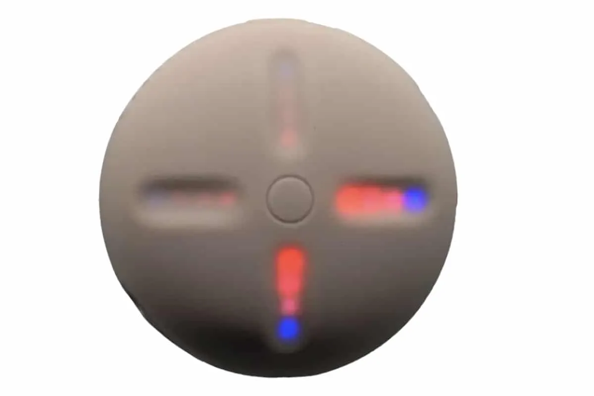 LED speaker with colorful lights on a round metallic surface, modern audio device, innovative speaker technology, optimal for