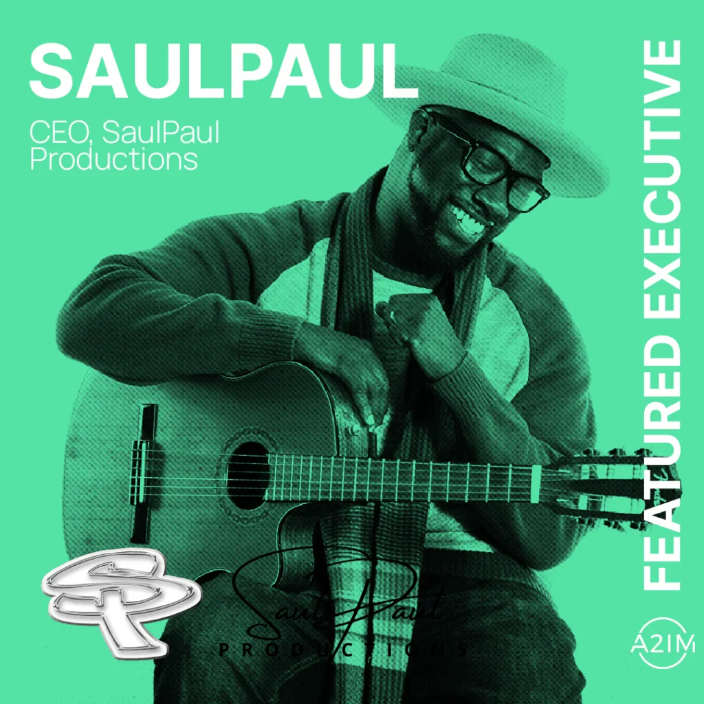 SaulPaul, music producer and CEO, plays guitar, promoting featured executive content, music industry insights, and leadership