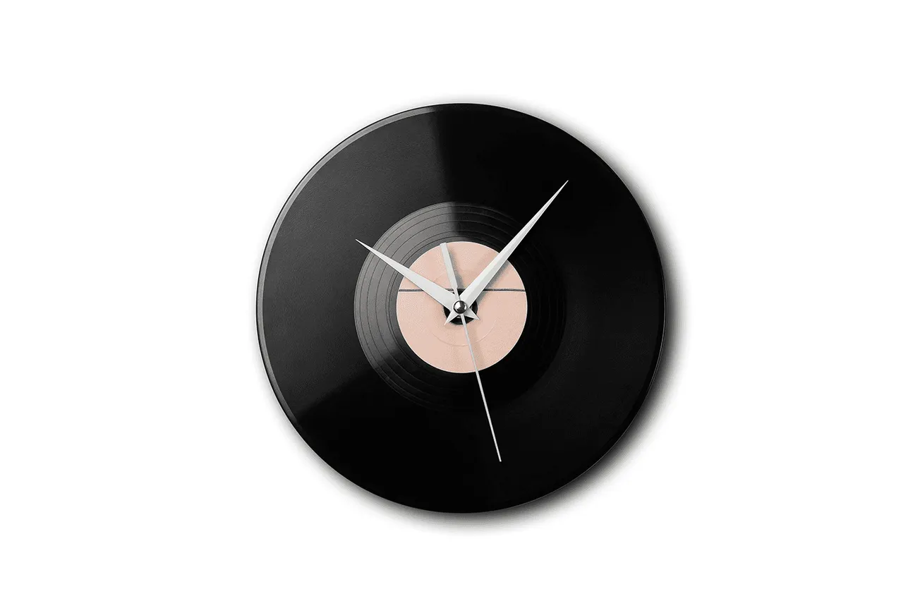 Vintage vinyl record wall clock with modern minimalist design and metal clock hands. Perfect for music lovers and stylish hom