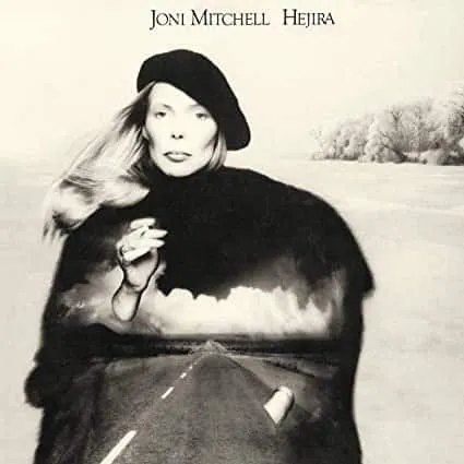 A black and white artistic photo of Joni Mitchell Hejira album cover featuring a woman in a beret, blending portrait and land