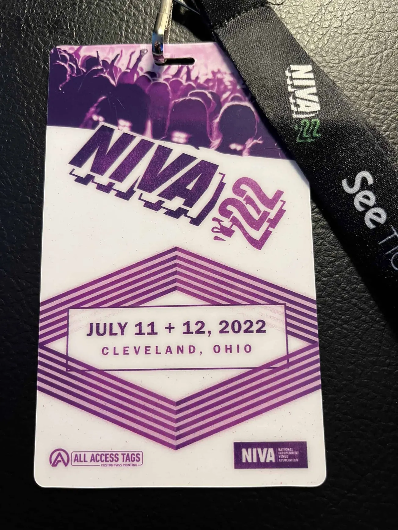 Vivid purple and white NIVA music festival pass for July 11-12, 2022, in Cleveland, Ohio, with geometric lines and event deta