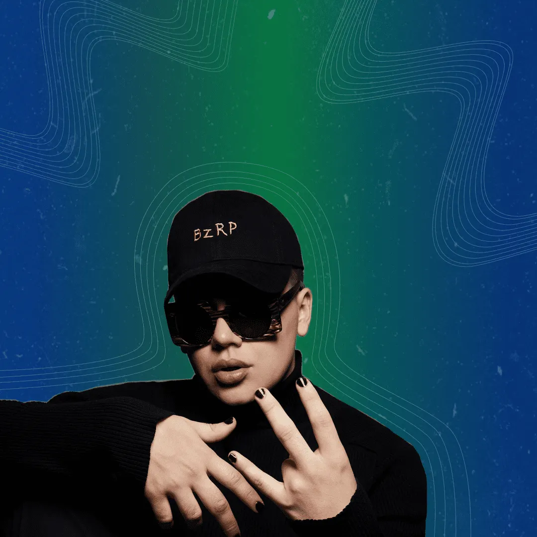 Bizarp fashion icon wearing black baseball cap with "BZRP" embroidery, oversized sunglasses, black turtleneck, and painted na